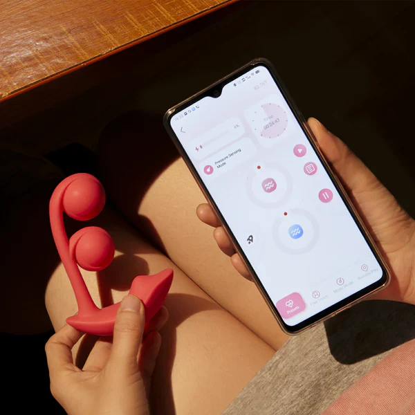 Clitoral and G-spot stimulator with pressure-sensing Kegel ball technology